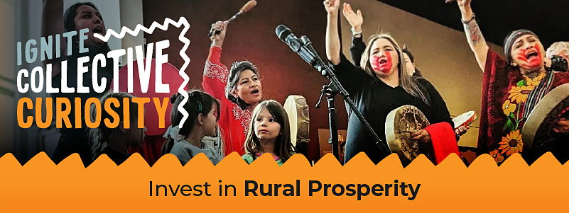 Children and adults drumming small Indigenous hand drums and singing together, representing investing in rural prosperity