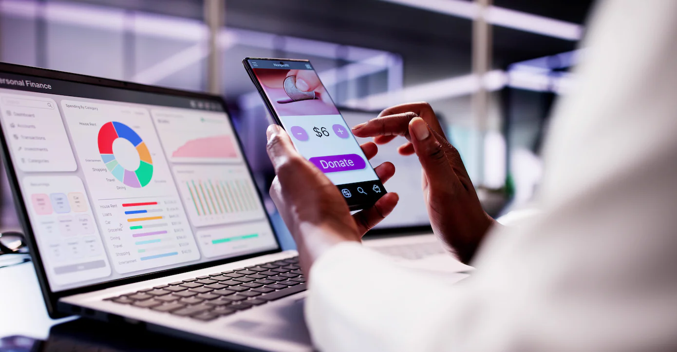 nonprofit software computer screen and mobile app