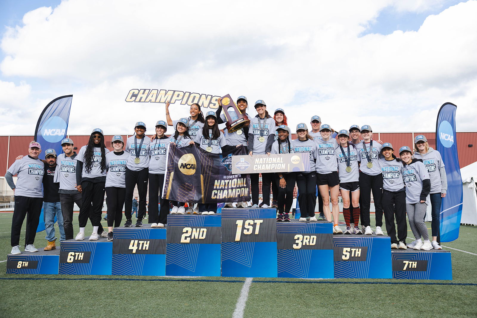 Members of the MIT Track and Field team receive an award