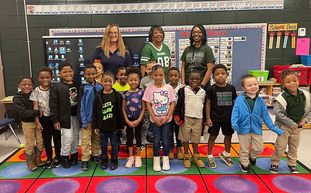 A group of children posing for a photo

Description automatically generated