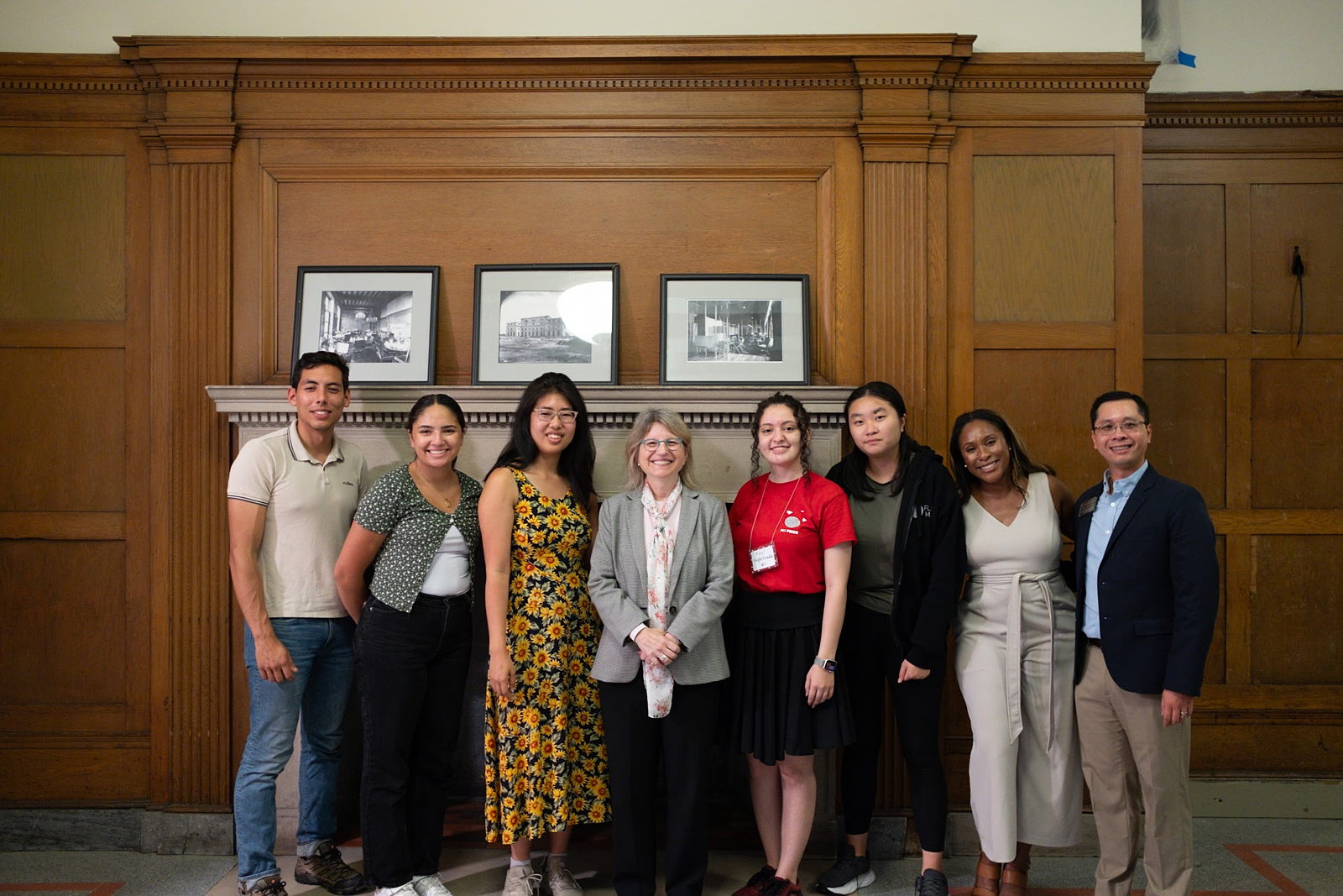 Students stand with President Kornbluth