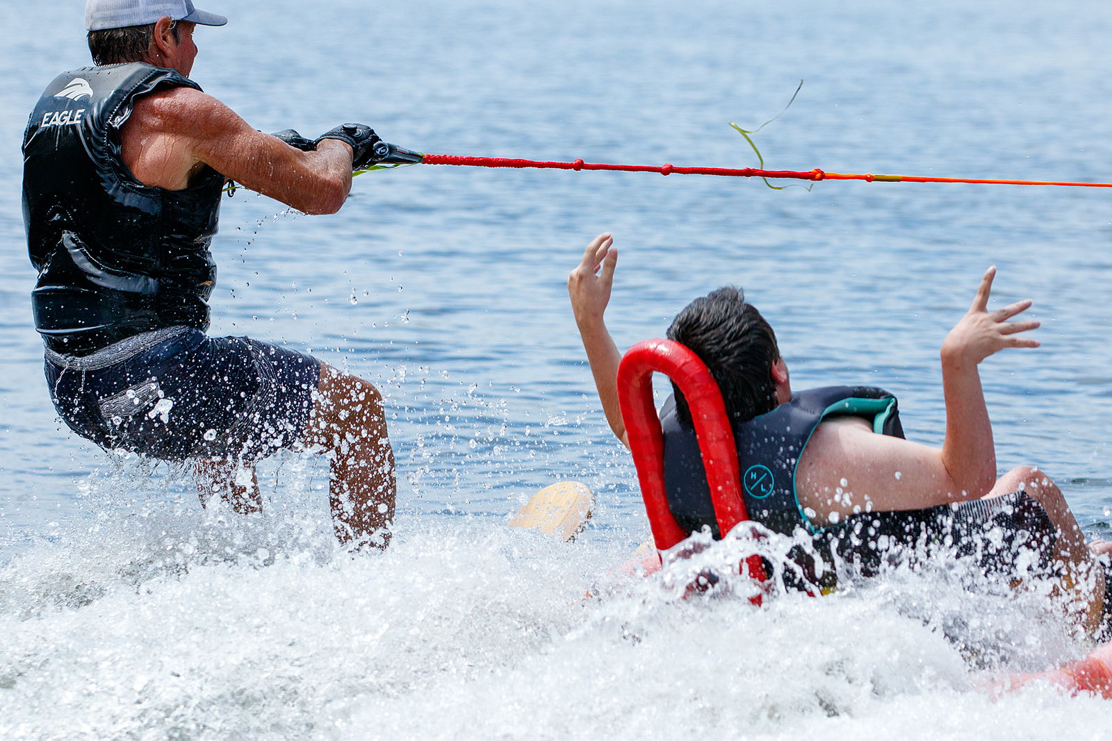 Sit skier and companion skier