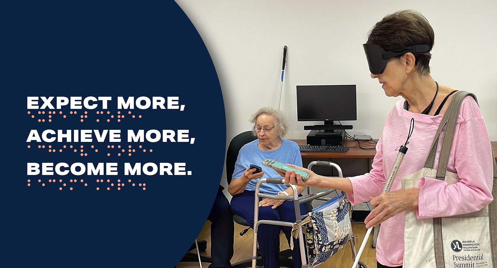 A photo of two senior saavi students working in tech class, one student practicing navigation using her phone under learning shades and another senior exploring her photo using voice over in the background. Large text next to the image that says " Expect more, achieve more, and become more." on a blue circle. 