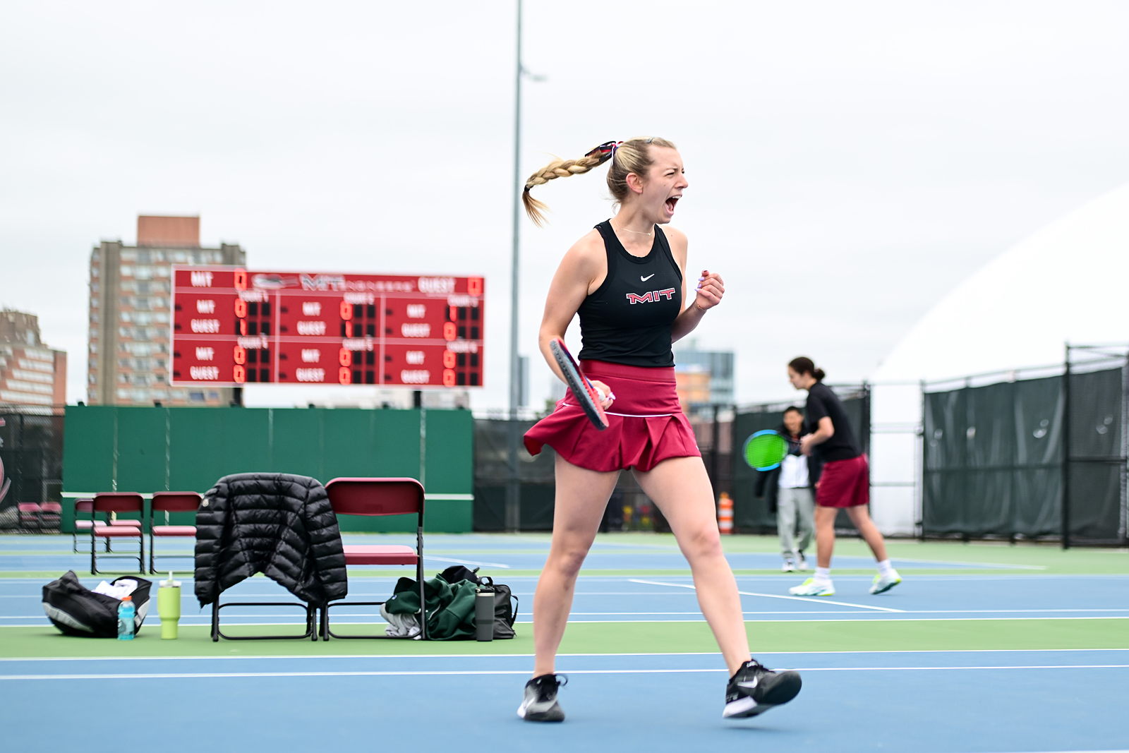 Women's tennis player cheers