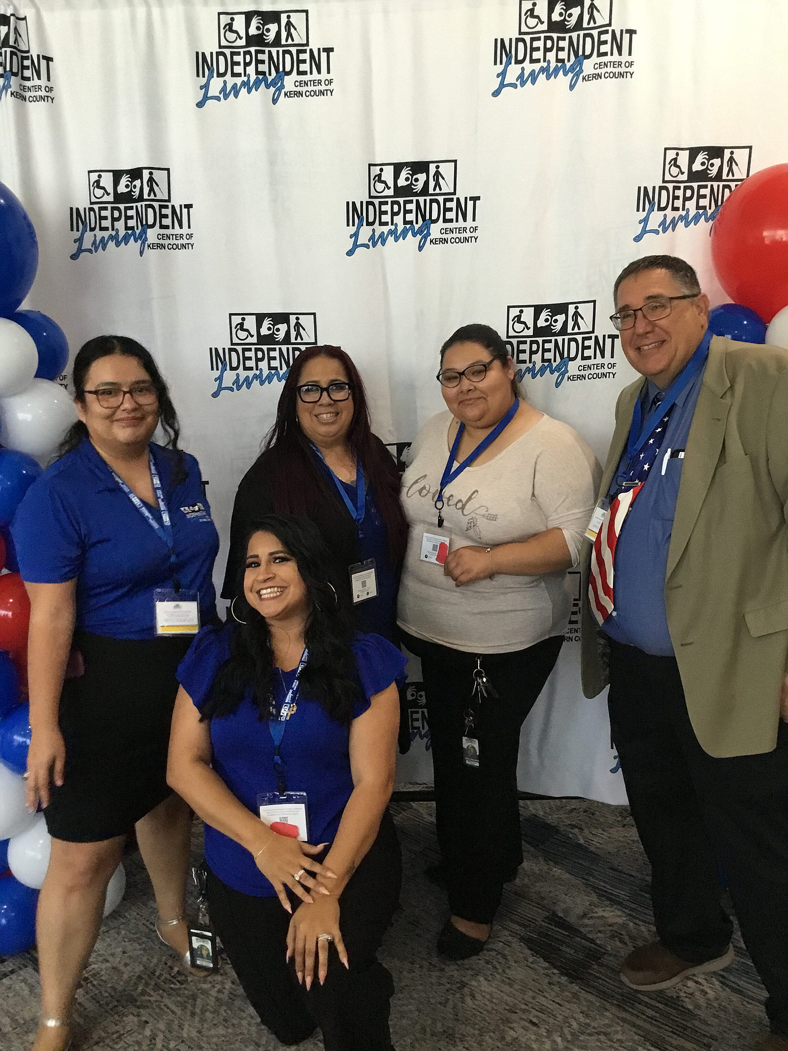 Four ILCKC staff at the 2025 KC ADA Conference. Four female and one male staff. 