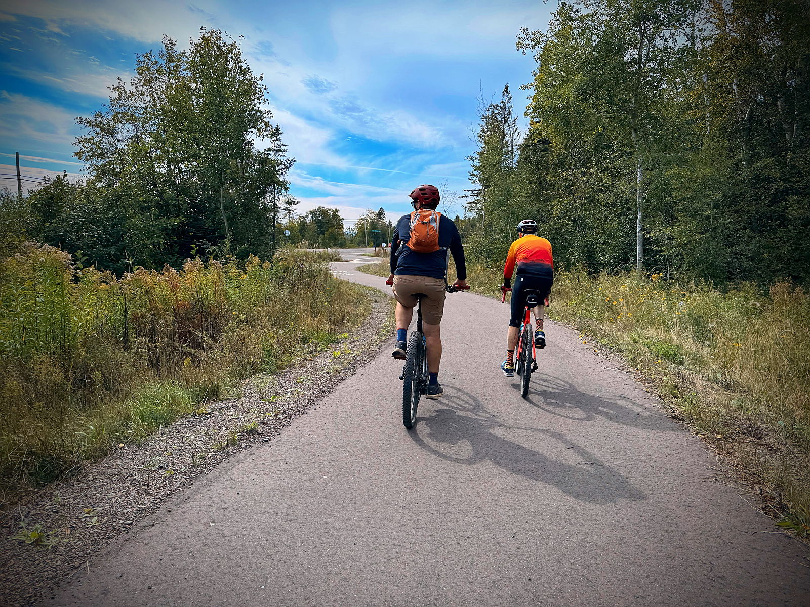 Two cyclists enjoy the new Gitchi-Gami State Trail segment in Lutsen, MN. 