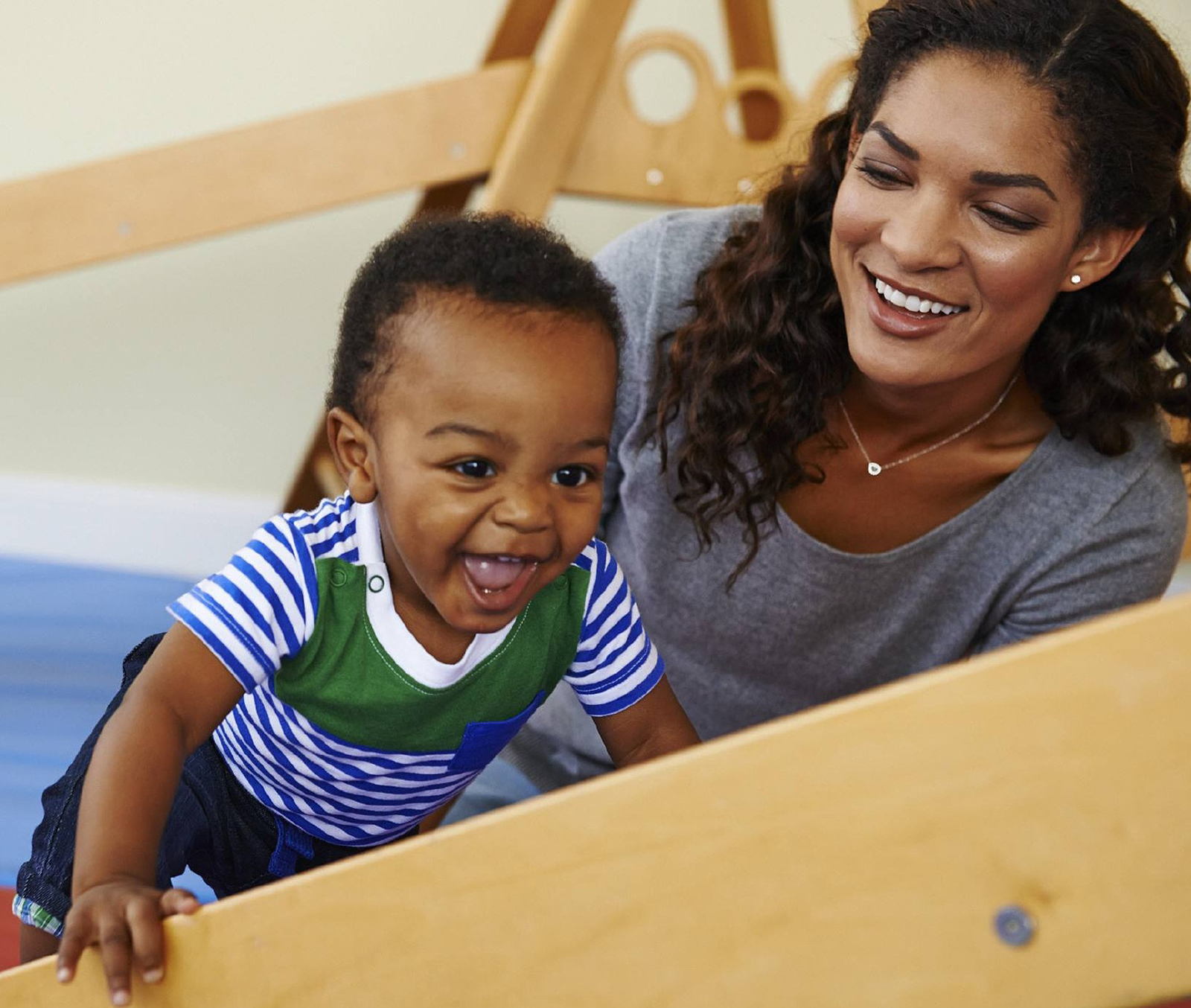 Mother playing with young child