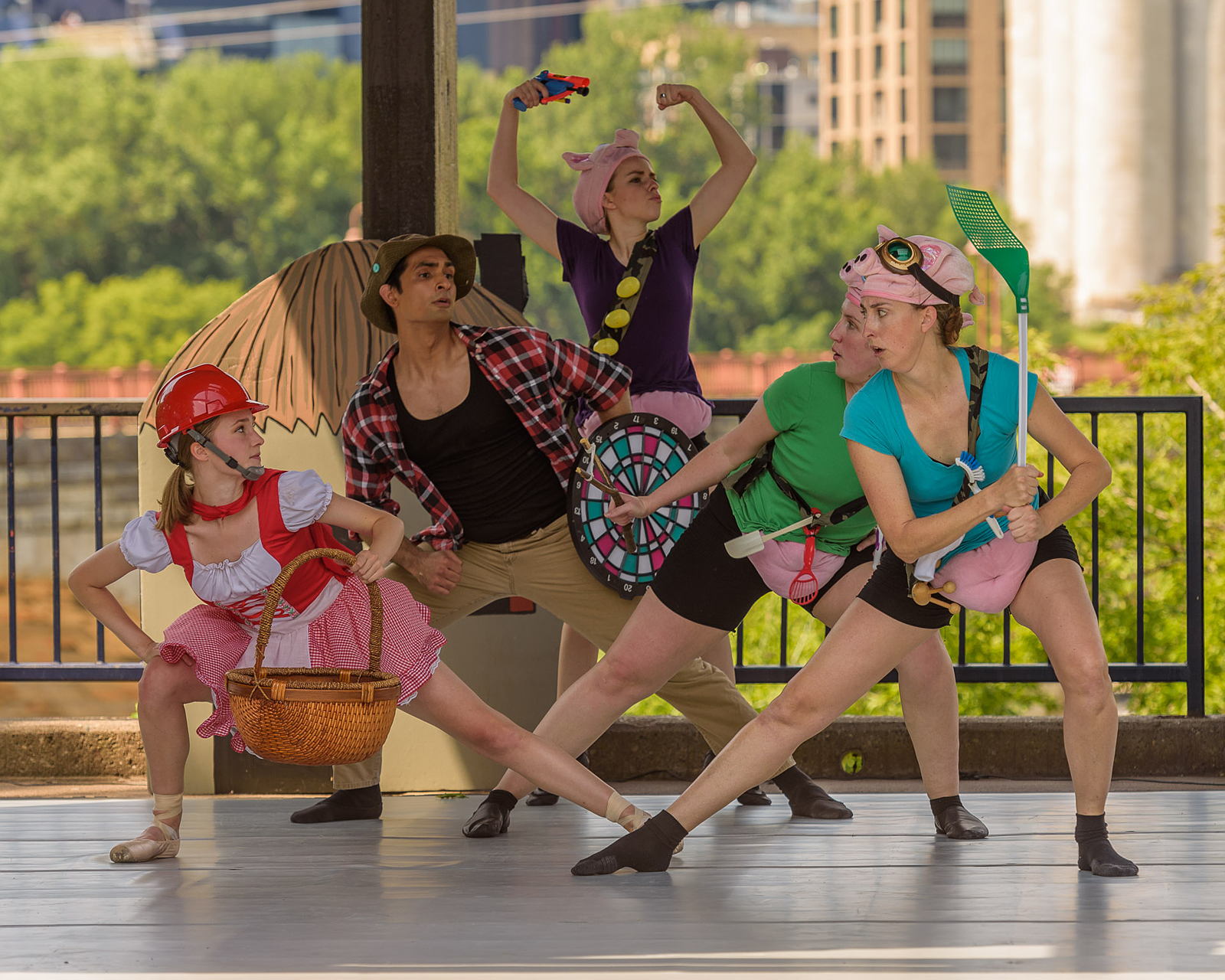 Cast of Wolf Tales in a pose with the city of Minneapolis in the backgroud. 
