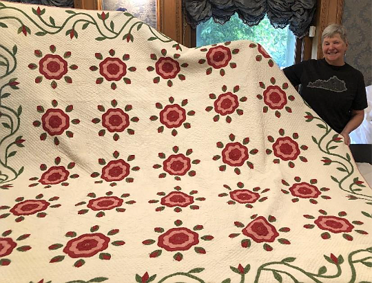 A person holding a blanket AI-generated content may be incorrect.