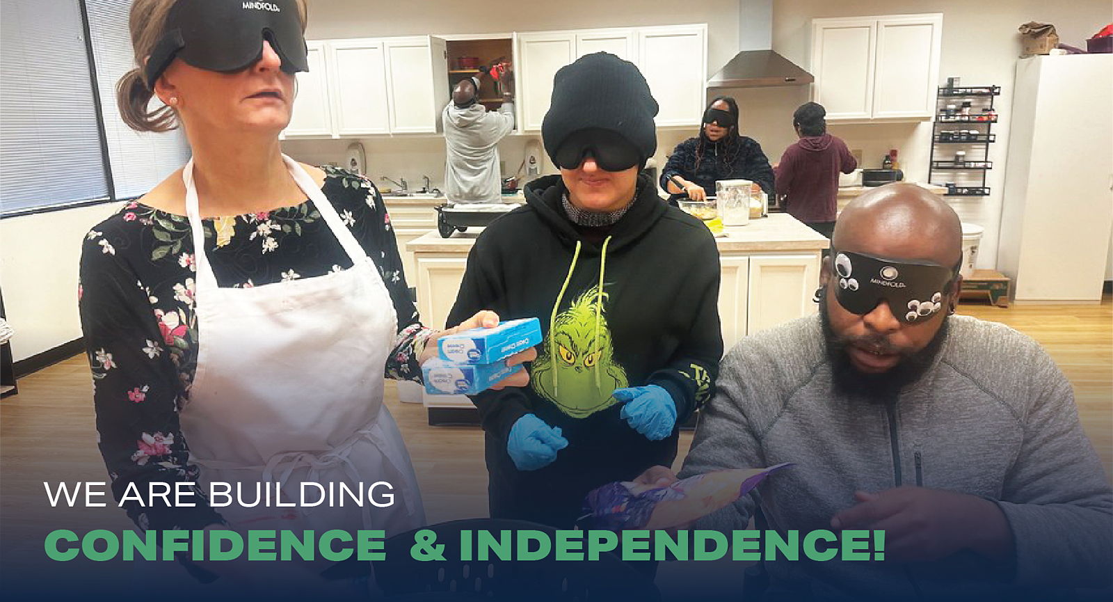 Photo of Saavi students and instructors, all under learning shade and working throughout a kitchen, handing ingredients to each other, putting items in cabinets, mixing ingredients and cooking. Large text over the photo that says " We are building confidence and Independence!" 