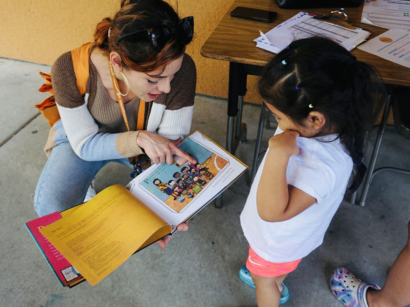 DEEP students with their books they earned for reading
