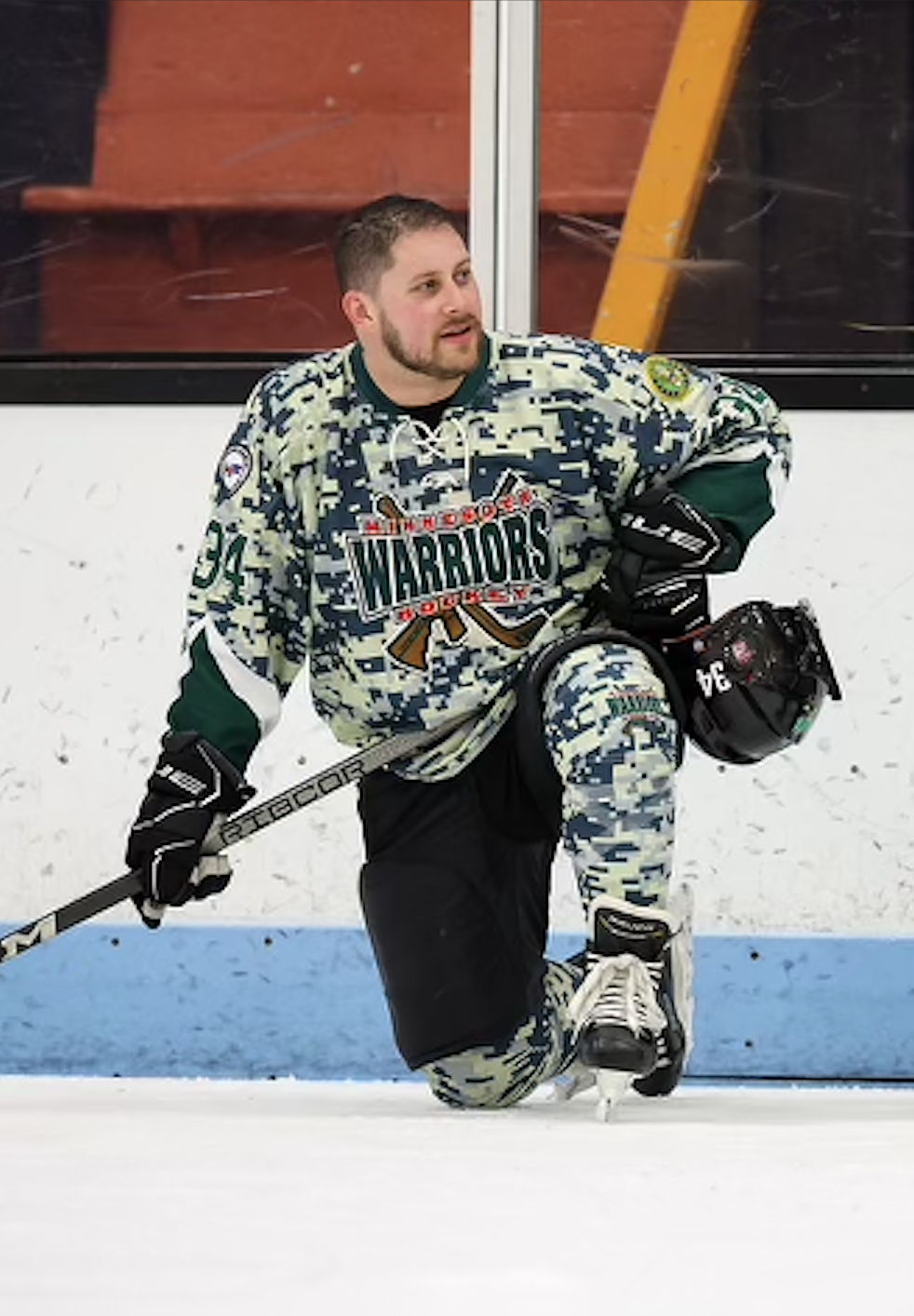 MN Warrior hockey player, Travis Bennett on the ice