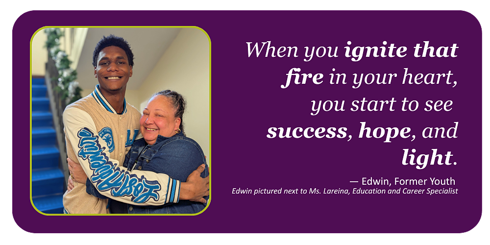 Photo of former youth hugging a woman, smiling at the camera